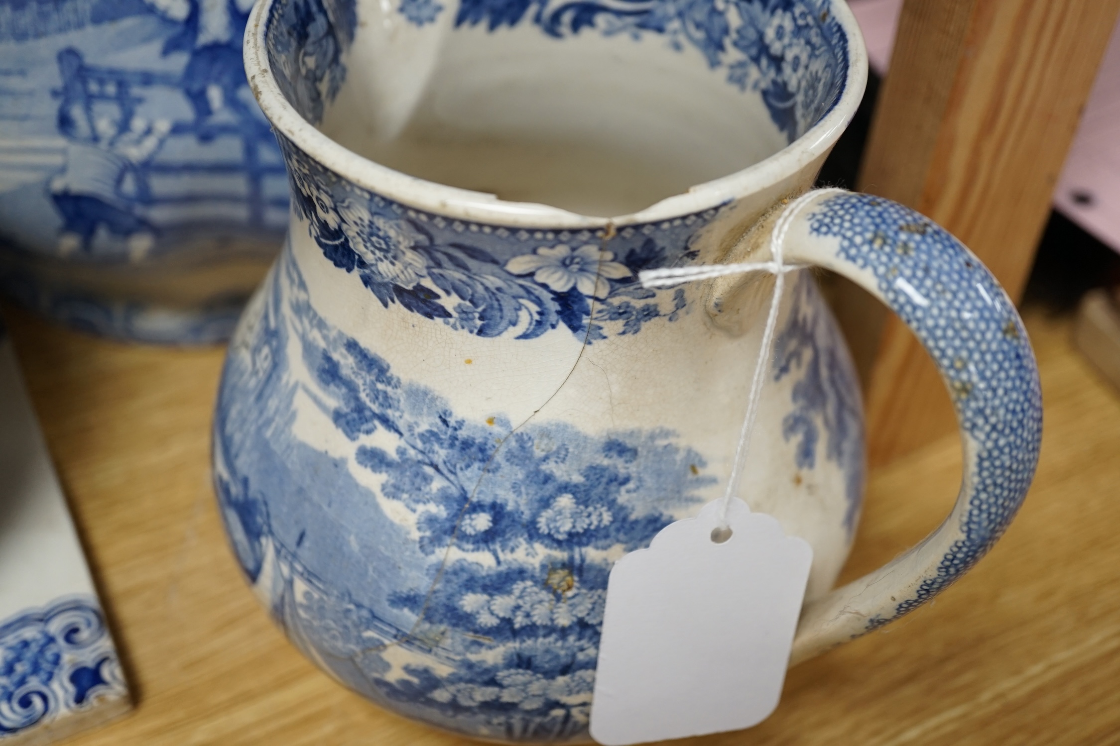 A collection of mixed blue and white dinnerware including Masons Ironstone, mostly plates and jugs. Condition - varies, poor to fair
